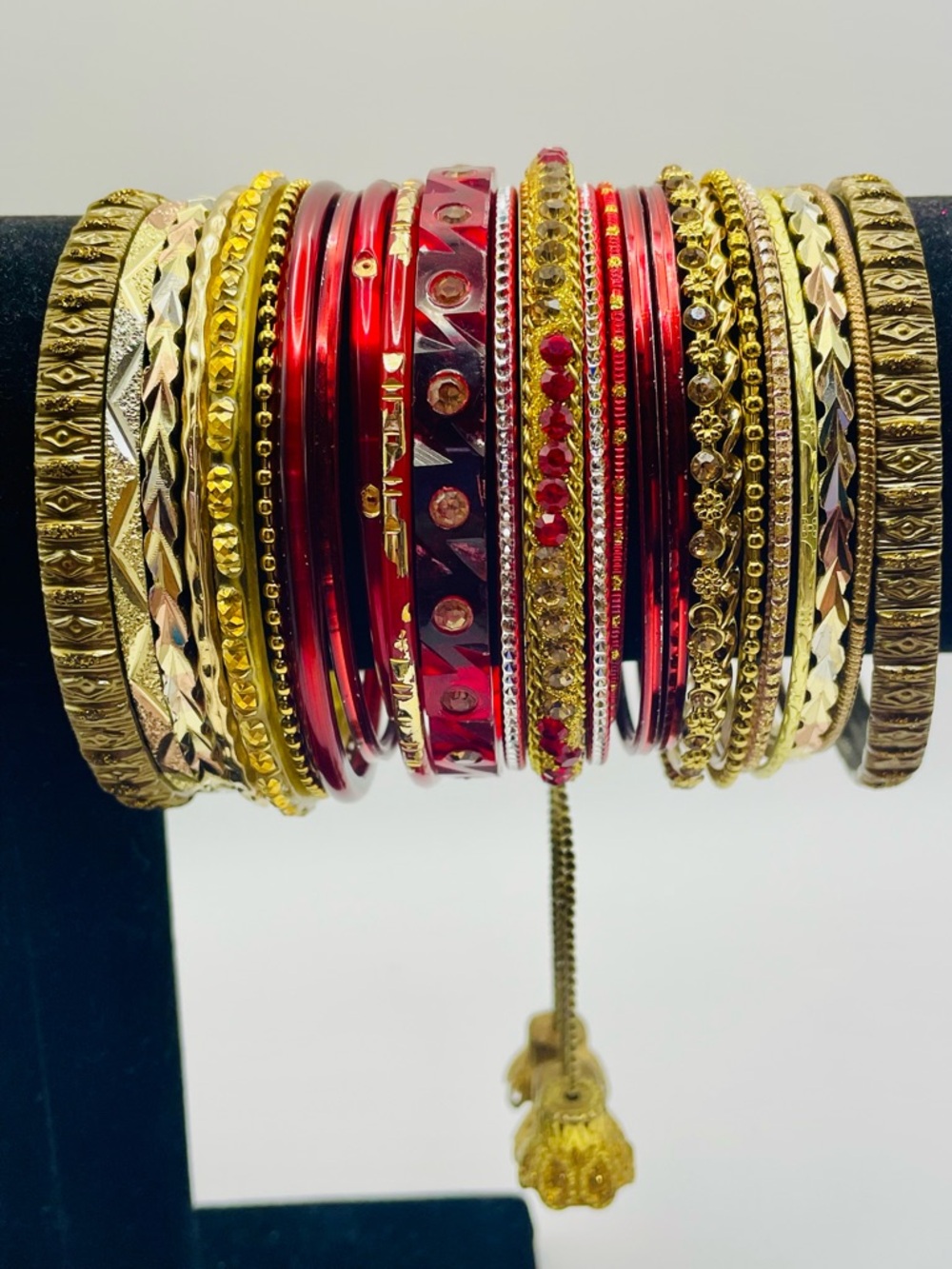 Red and Gold Ornate Bangle Bracelet Set. 24 bracelets. Size 7 to 7 3/4 inch